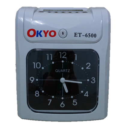 
          	<h3 class='specs'>Specification</h3>
          	<ul>
          		<li>Dual Clock Display</li>
				<li>Primary Clock : Analog</li>
				<li>Secondary Clock : Digital (On top)</li>
				<li>2 Colors Printing : Black & Red</li>
				<li>Powerful Printhead : 9 Pin Dot Matrix</li>
				<li>Columns : 6 Columns</li>
				<li>In & Out Shift : Auto / Manual</li>
				<li>Backup : Full Memory</li>
				<li>Auto Card Search : Adjustable On / Off</li>
				<li>Music / Melody : Adjustable</li>
				<li>Perpetual Calendar : With</li>
				<li>Output Power Supply : Bell / Siren</li>
          	</ul>
          	